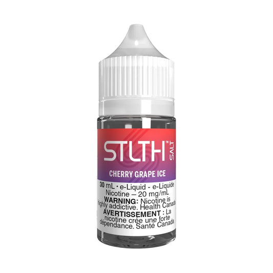 A 30mL bottle of STLTH Salt Cherry Grape Ice e-liquid featuring a white child-resistant cap and a red and purple gradient label with a nicotine warning.