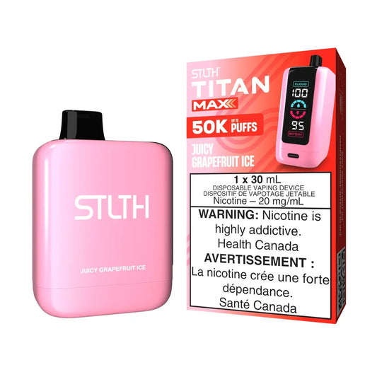 A pink STLTH Titan Max 50K Juicy Grapefruit Ice disposable vape with a digital screen showing e-liquid and battery levels, positioned next to its red and white retail packaging.