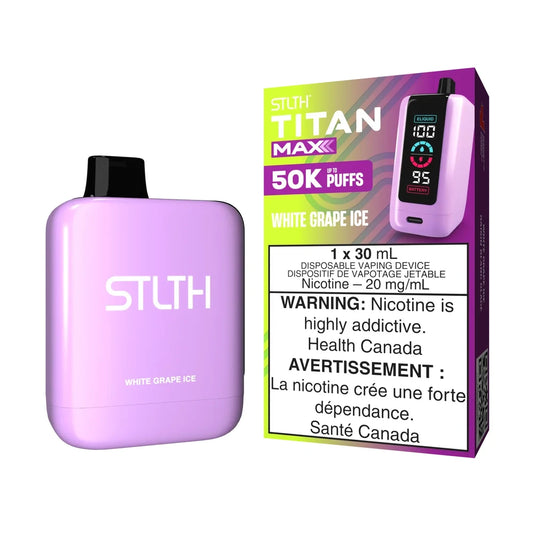 A light purple STLTH Titan Max 50K White Grape Ice disposable vape stands next to its retail packaging featuring an LED screen display and a nicotine warning label.