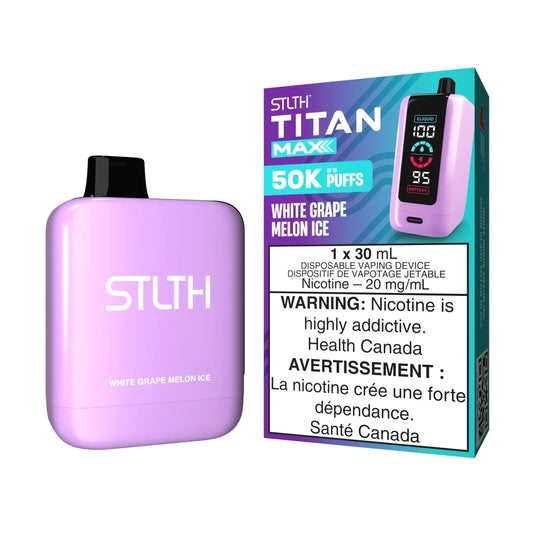 A light purple STLTH Titan Max 50K White Grape Melon Ice disposable vape stands next to its teal and purple packaging, which displays product specifications and a health warning.