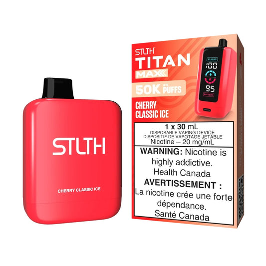 A red STLTH Titan Max 50K Cherry Classic Ice disposable vape device stands next to its orange and red packaging, featuring a digital display for e-liquid and battery levels.