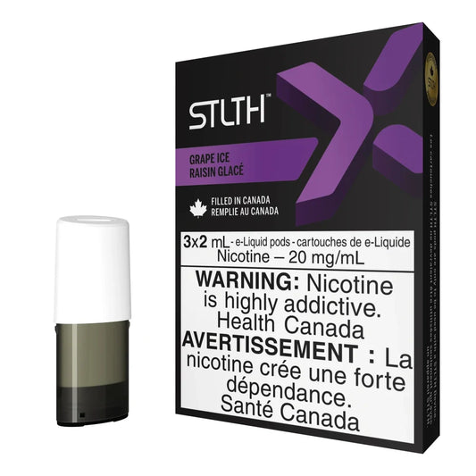 A single STLTH X Grape Ice e-liquid pod with a white mouthpiece stands next to its black and purple packaging featuring the STLTH logo and a nicotine warning label.